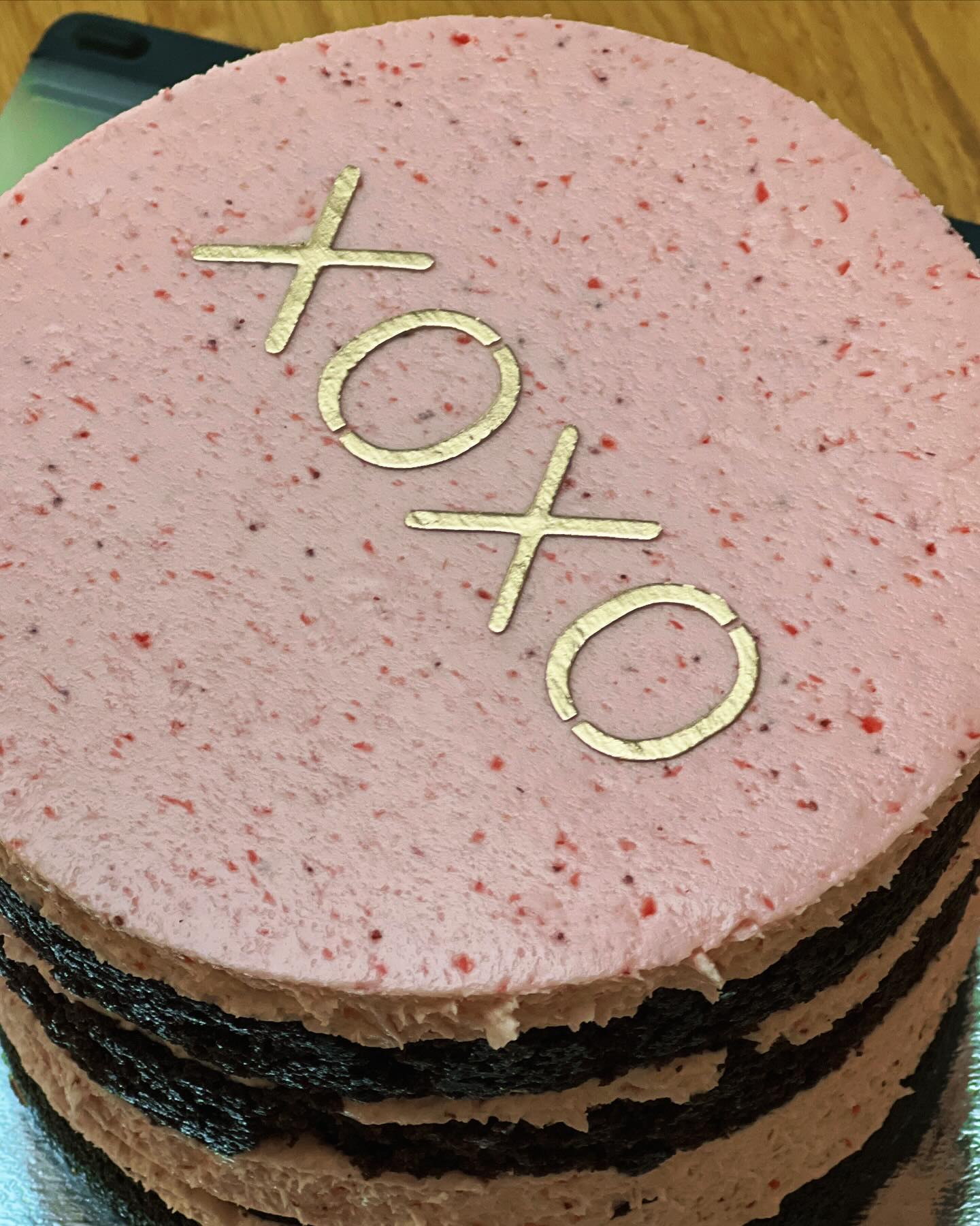 Happy Valentine’s Day to all who celebrate.  I ordered this amazing cake (chocolate with strawberry buttercream icing) for work today. And bought myself 2 dozen tulips.